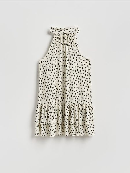 Sukienka mini w groszki - beżowy. Brązowe sukienki damskie Reserved, l, bez wzorów, z dzianiny, bez kołnierzyka, bez ramiączek, mini. Za 99.99 zł.