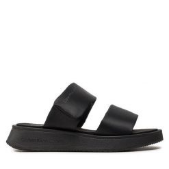 Klapki Calvin Klein Jeans. Czarne klapki damskie Calvin Klein Jeans, bez wzorów, z jeansu, bez obcasa. Za 429.99 zł.