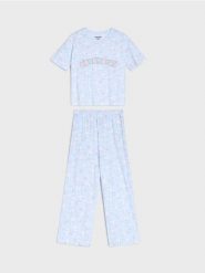 Piżama dwuczęściowa Cinnamoroll z koszulką o kroju boxy - błękitny. Niebieskie koszulki dziewczęce Sinsay, l, bez wzorów, bez ramiączek. Za 35.99 zł.