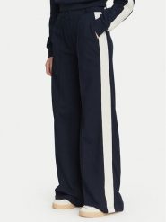 Guess Spodnie materiałowe V6YB26 K5139 Granatowy Relaxed Fit. Niebieskie spodnie materiałowe damskie Guess, z aplikacjami, z bawełny. Za 434.99 zł.