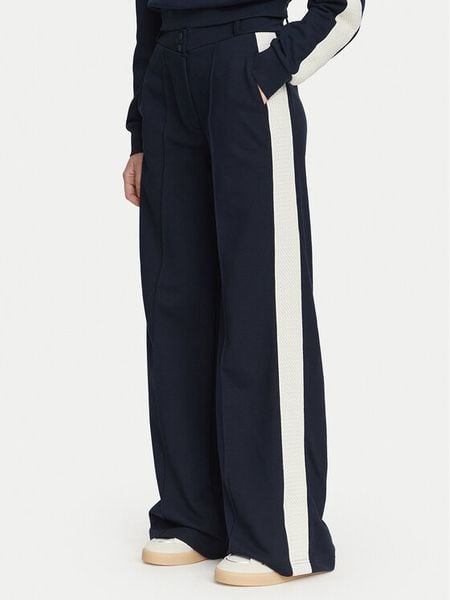 Guess Spodnie materiałowe V6YB26 K5139 Granatowy Relaxed Fit. Niebieskie spodnie materiałowe damskie Guess, z aplikacjami, z bawełny. Za 434.99 zł.