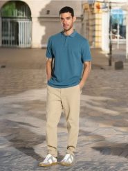 Spodnie chino slim - beżowy. Brązowe spodnie materiałowe męskie Sinsay, bez wzorów. Za 49.99 zł.