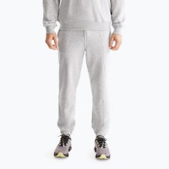 Spodnie męskie On Club. Szare spodnie materiałowe męskie On Running, bez wzorów. Za 359.99 zł.