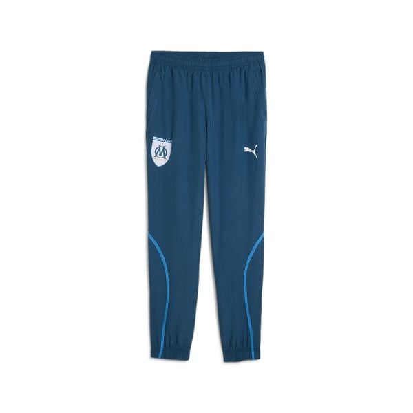 Męskie spodnie przedmeczowe z tkaniny Olympique Marsylia PUMA. Niebieskie spodnie materiałowe męskie Puma, bez wzorów, z materiału. Za 289.00 zł.