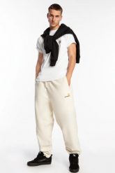 Spodnie Męskie Carhartt WIP American Script Jogging Pant Natural BEŻOWE. Brązowe spodnie materiałowe męskie Carhartt, bez wzorów, z bawełny. Za 419.00 zł.
