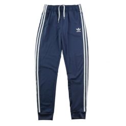 Spodnie dresowe męskie Adicolor SST Track Pants. Niebieskie spodnie sportowe męskie Adidas, z dresówki. Za 116.16 zł.