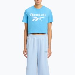 Koszulka Reebok Identity Big Logo Crop Tee. Niebieskie bluzki damskie REEBOK FITNESS, bez wzorów, bez ramiączek. Za 69.99 zł.