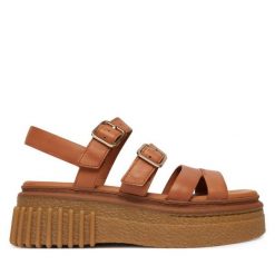 Sandały Clarks. Brązowe sandały damskie Clarks, bez wzorów, bez obcasa, na płaskiej podeszwie. Za 519.99 zł.