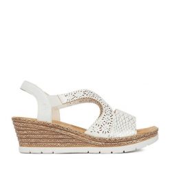 Sandały Rieker. Białe sandały damskie Rieker, bez wzorów, bez obcasa, na koturnie. Za 319.99 zł.