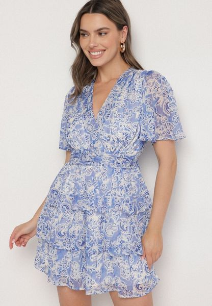 Niebieska Sukienka z Falbanami i Abstrakcyjnym Wzorem Rinasea. Niebieskie sukienki damskie Born2be, na co dzień, l, bez wzorów, z jeansu, eleganckie, bez kołnierzyka, bez ramiączek, mini. Za 129.99 zł.