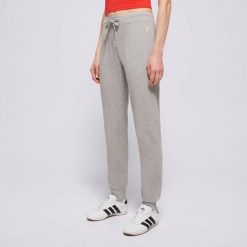 SPODNIE DRESOWE DAMSKIE CHAMPION-SPODNIE RIB CUFF PANTS XS. Szare spodnie sportowe damskie CHAMPION, uniwersalny, z bawełny, na fitness i siłownię. Za 75.28 zł.