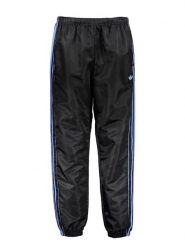 Adidas Spodnie dresowe w kolorze czarno-niebieskim rozmiar: L. Czarne spodnie dresowe damskie Adidas, l, bez wzorów, z dresówki. Za 131.12 zł.