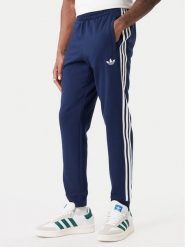 Adidas Spodnie dresowe 3-Stripes KE3561 Granatowy Slim Fit. Niebieskie spodnie dresowe męskie Adidas, bez wzorów, z bawełny. Za 259.99 zł.