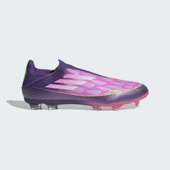 Buty piłkarskie ADIDAS F50 Yamal League Laceless FG/MG. Zielone buty sportowe na co dzień damskie Adidas, z materiału, bez zapięcia, do piłki nożnej. Za 289.99 zł.