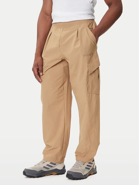 Adidas Spodnie outdoor Terrex Xploric JM7424 Beżowy Loose Fit. Brązowe spodnie sportowe męskie Adidas, z syntetyku. Za 399.99 zł.