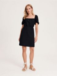 Sukienka z bufiastymi rękawami - czarny. Czarne sukienki damskie Reserved, l, bez wzorów, z bawełny, klasyczne, bez kołnierzyka, bez ramiączek. W wyprzedaży za 59.99 zł.