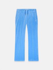 Juicy Couture Spodnie dresowe w kolorze błękitnym rozmiar: L. Niebieskie spodnie dresowe damskie Juicy Couture, l, bez wzorów, z dresówki. Za 173.99 zł.