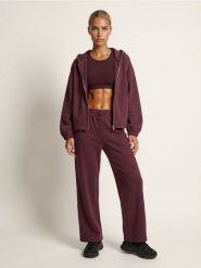 Rozpinana bluza z kapturem Active z domieszką wiskozy soft touch - czerwony. Czerwone bluzy sportowe damskie Sinsay, l, bez wzorów, z wiskozy, bez ramiączek, z kapturem. Za 59.99 zł.