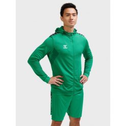 Bluza z kapturem sportowa Hummel Authentic Poly Zip Hoodie. Niebieskie bluzy sportowe damskie HUMMEL, bez wzorów, sportowe, bez kołnierzyka, bez ramiączek. Za 199.90 zł.