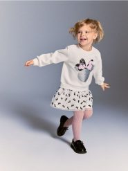 Sukienka Minnie Mouse - złamana biel. Sukienki dziewczęce Reserved, bez wzorów, z bawełny, bez ramiączek. Za 79.99 zł.