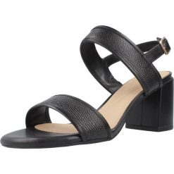 Sandały Clarks Model Ezoria Sling Kolor Czarny. Czarne sandały damskie Clarks, bez wzorów, ze skóry, bez obcasa, na obcasie. Za 362.05 zł.