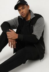 Czarna Bluza Rozpinana ze Stójką i Kieszeniami Zdobiona Kontrastowymi Wstawkami Naivare. Czarne bluzy bez kaptura męskie Born2be, l, z jeansu. Za 89.99 zł.