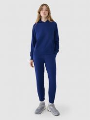 4F Spodnie dresowe joggery damskie - granatowe S. Niebieskie spodnie dresowe damskie 4f, l, bez wzorów, z bawełny. Za 129.99 zł.