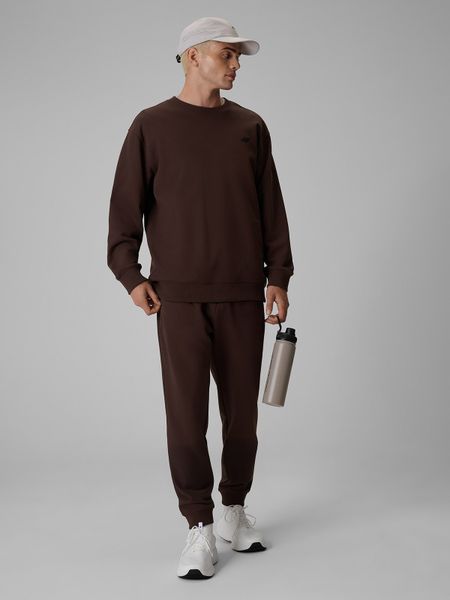 4F Spodnie dresowe joggery męskie - brązowe M. Brązowe spodnie dresowe męskie 4f, bez wzorów, z dresówki. Za 149.99 zł.