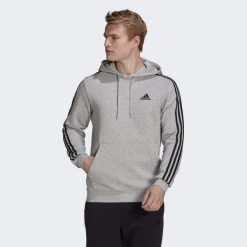 Bluza z kapturem adidas Essentials Fleece, Mężczyźni. Czarne bluzy bez kaptura męskie Adidas, m, z dresówki. Za 222.00 zł.