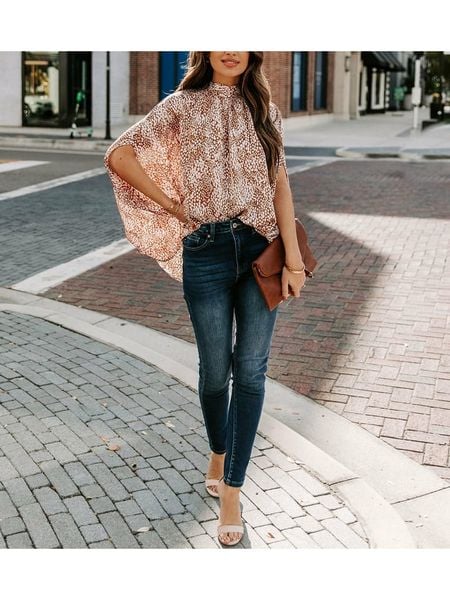 Milan Kiss Bluzka w kolorze kremowo-jasnobrązowym rozmiar: XL. Brązowe bluzki damskie Milan Kiss, xl, bez wzorów, bez kołnierzyka, bez ramiączek. Za 178.45 zł.