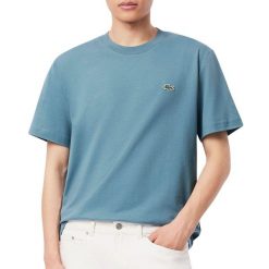 Koszulki Lacoste Model Th7318 Tee-shirt Kolor Niebieski. Niebieskie t-shirty damskie Lacoste, m, bez wzorów, z tkaniny, bez kołnierzyka. Za 278.80 zł.