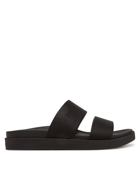 Calvin Klein Klapki Flat Slide Jacq HW0HW02487 Czarny. Czarne klapki damskie CALVIN KLEIN, bez wzorów, z materiału, bez obcasa. Za 439.99 zł.