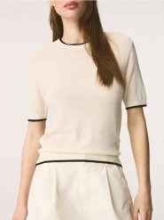 Wełniany t-shirt - złamana biel. T-shirty damskie Reserved, l, bez wzorów, z wełny, bez kołnierzyka. Za 159.99 zł.