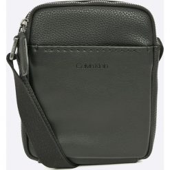 Calvin Klein - Saszetka. Czarne saszetki męskie CALVIN KLEIN, z materiału. W wyprzedaży za 279.90 zł.