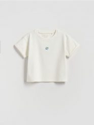 Luźny t-shirt z haftem - złamana biel. Koszulki dziewczęce Reserved, m, bez wzorów, z bawełny, bez ramiączek. Za 25.99 zł.