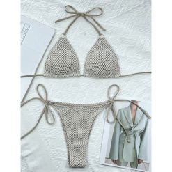 Bikini trójkątne z regulowanymi wiązaniami na plażę Tarana. Czarne bikini damskie Intica, bez wzorów. W wyprzedaży za 149.00 zł.