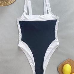 Jednoczęściowy strój kąpielowy minimalistyczny na plażę i basen Engelien. Czarne stroje jednoczęściowe damskie Intica, l, bez wzorów. Za 159.00 zł.