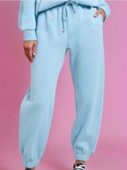 Spodnie jogger - błękitny. Niebieskie spodnie materiałowe damskie Sinsay, bez wzorów. Za 39.99 zł.