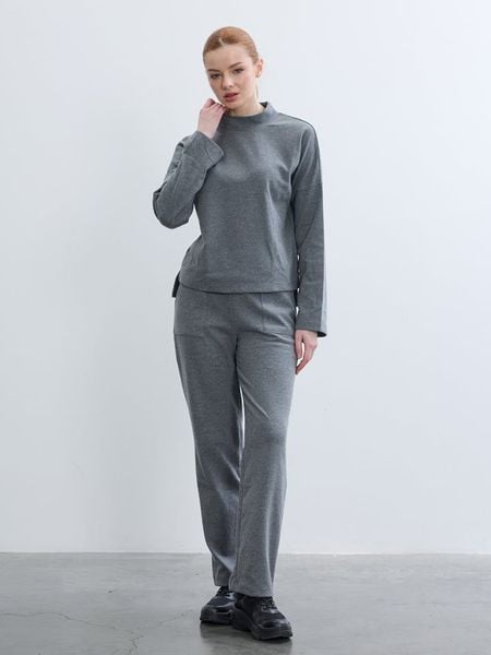 BGN Koszulka w kolorze szarym rozmiar: 38. Szare bluzki damskie BGN, bez wzorów, bez kołnierzyka, bez ramiączek. Za 100.99 zł.