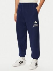 Adidas Spodnie dresowe Seasonal Essentials Collegiate French Terry Cuffed KG0521 Granatowy Regular Fit. Niebieskie spodnie dresowe męskie Adidas, bez wzorów, z dresówki. Za 239.99 zł.