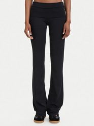 Guess Legginsy V6YB24 K4713 Czarny Slim Fit. Czarne legginsy damskie Guess, xs, z aplikacjami, z syntetyku. Za 264.99 zł.