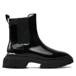 Sztyblety DKNY. Czarne botki damskie DKNY, bez obcasa, na płaskiej podeszwie, bez zapięcia. Za 829.99 zł.