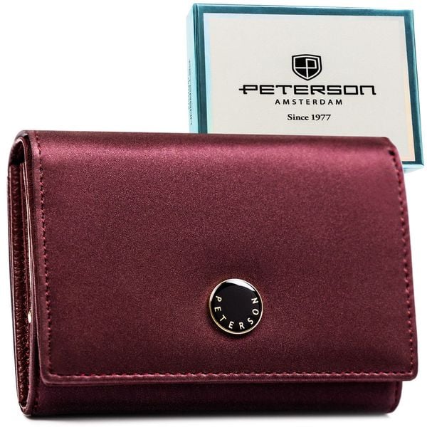 Skórzany portfel damski zamykany na zatrzask, odszyty ze skóry naturalnej i ekologicznej w fioletowym kolorze PTN PS445-HNL Peterson. Fioletowe portfele damskie Peterson, bez wzorów, ze skóry. Za 119.99 zł.