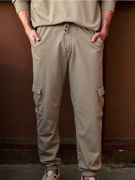 Spodnie jogger cargo - Inny. Spodnie materiałowe męskie Sinsay, bez wzorów. W wyprzedaży za 45.99 zł.