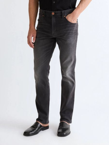 MESKIE SPODNIE WRANGLER GREENSBORO RAVEN ASH 112377796. Spodnie materiałowe męskie Wrangler, bez wzorów, z jeansu. Za 189.99 zł.
