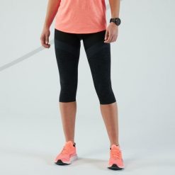 Legginsy do biegania krótkie damskie Kiprun Care. Czarne legginsy sportowe damskie KIPRUN, l, bez wzorów, z elastanu, z podwyższonym stanem, do biegania. Za 59.99 zł.