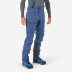 Spodnie alpinistyczne Ice wodoodporne męskie. Niebieskie spodnie materiałowe męskie SIMOND, bez wzorów, z elastanu, sportowe. Za 599.99 zł.