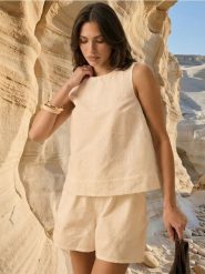 Luźne bawełniane szorty z haftem - biały. Białe szorty damskie Sinsay, bez wzorów, z bawełny. Za 39.99 zł.