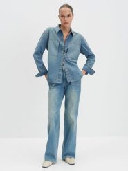 Someday Bluzka dżinsowa "Zutie" w kolorze niebieskim rozmiar: 38. Niebieskie bluzki damskie Someday, bez wzorów, z bawełny, bez kołnierzyka, bez ramiączek. Za 173.99 zł.