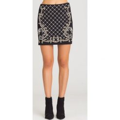 CZARNA SPÓDNICA GUESS ZE ZDOBIENIAMI. Czarne spódniczki damskie Guess, l, z aplikacjami, mini. Za 294.50 zł.